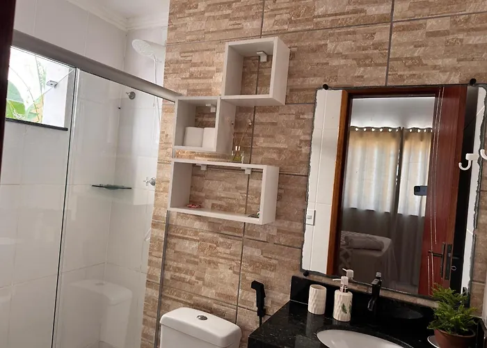 APARTAMENTO COM SUITE EM CONDOMÍNIO FECHADO com estacionamento próprio Porto Seguro