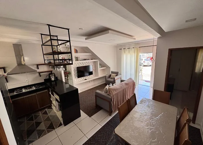 APARTAMENTO COM SUITE EM CONDOMÍNIO FECHADO com estacionamento próprio Porto Seguro